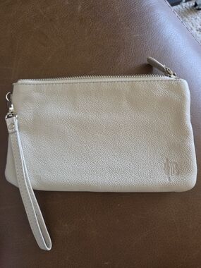 Pebbled Cream Leather Wristlet Clutch with Monogram Detail
